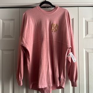 Brand new pink long sleeve from Disney world. Purchased and just never wore it!